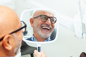 a dental implant patient smiling