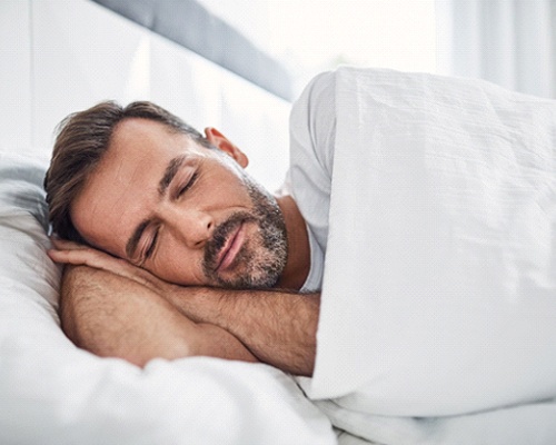 Man sleeping peacefully after successful Solea Sleep treatment