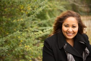 Smiling woman with porcelain veneers