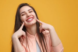 Woman smiling happily.